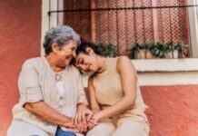 Grandmother and granddaughter together outdoor