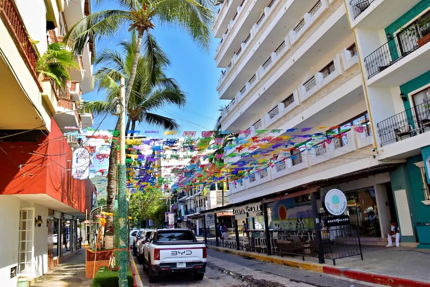 Vehicles parked on a street in Puerto Vallarta.