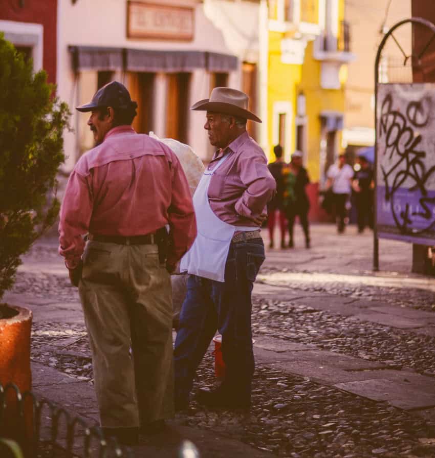 Two Mexican men on a street in Guanajuato