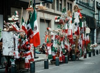 Vendors line the street of Mexico City's historic center during Independence Day celebrations.