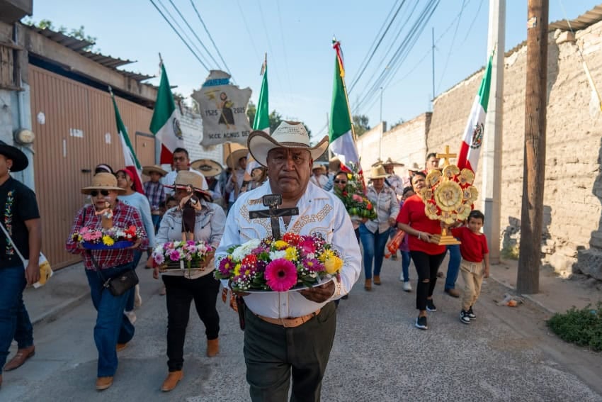 Townspeople in San Juan de la Vega, Guanajuato venerating their patron saint