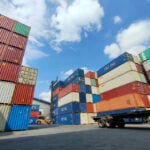 A shipyard filled with import-export storage containers