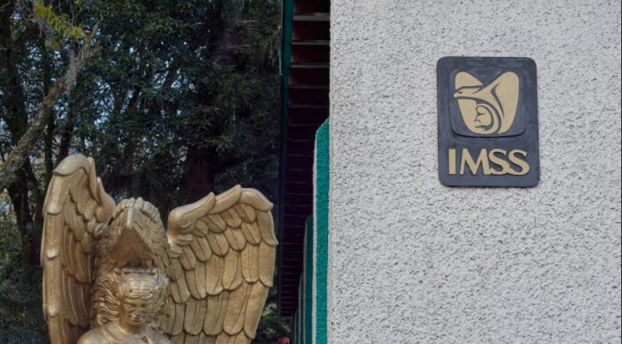 Xalapa, Mexico - February 24, 2026 - Photograph of the entrance to IMSS Health Clinic No. 10 in the city of Xalapa, featuring a golden angel statue next to the sign.