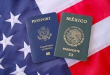 United States and Mexican passports on American flag background, dual citizenship and international travel concept