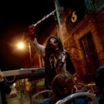 An undead actor on Turibux CDMX's after-dark Turibus Terror tours in October and early November.