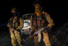 The Jalisco New Generation Cartel (CJNG), whose members are seen here patrolling near Morelia, Michoacán, continues to function largely as it did before El Mencho's death, according to OSAC.