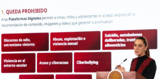 President Sheinbaum with a presentation reading "Queda prohibido" with a list of topics that will prohibited for minors on social media, at her Oct. 9 mañanera press conference