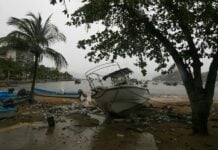The cloud bands from Hurricane Simon have brought heavy rain to the port of Acapulco.