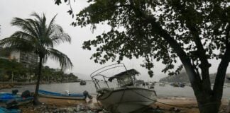The cloud bands from Hurricane Simon have brought heavy rain to the port of Acapulco.