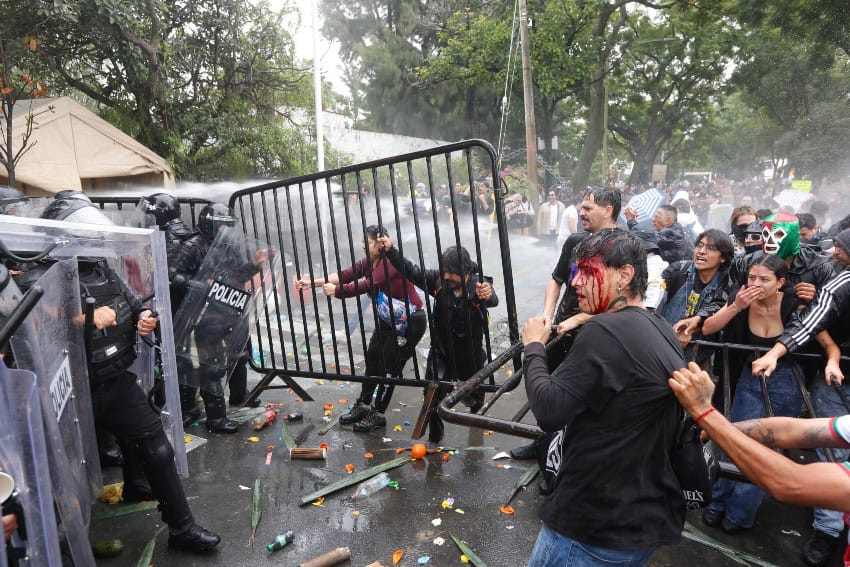 Blood flows from a water protester in Guadalajara