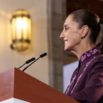 President Sheinbaum at her Oct. 8 press conference podium