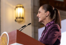 President Sheinbaum at her Oct. 8 press conference podium