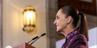 President Sheinbaum at her Oct. 8 press conference podium