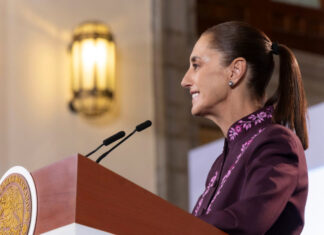 President Sheinbaum at her Oct. 8 press conference podium