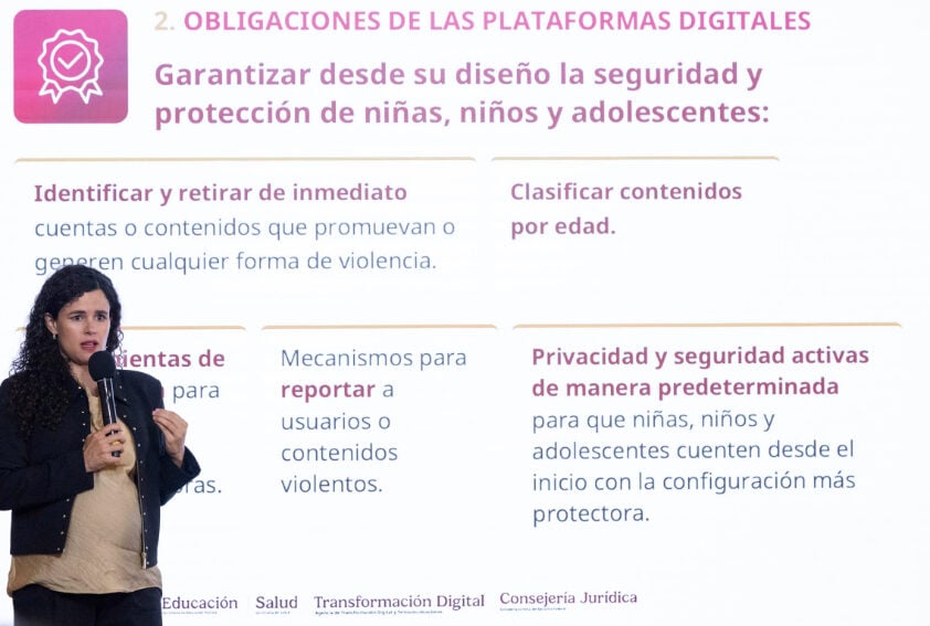 Presidential legal counsel Luisa María Alcalde with a presentation showing the obligations of social media platforms under a proposed presidential decree
