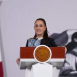President Sheinbaum at the podium of her October 15 press conference
