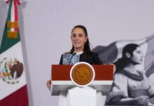 President Sheinbaum at the podium of her October 15 press conference