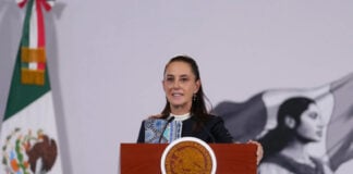 President Sheinbaum at the podium of her October 15 press conference