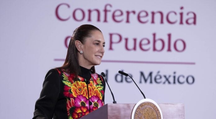 Sheinbaum at podium on Oct. 26, 2026