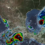 Satellite image showing Hurricane Isaias in the Gulf of Mexico and Tropical Storm Simon off the Pacific coast of Guerrero in Mexico, 10am central time on Oct. 8