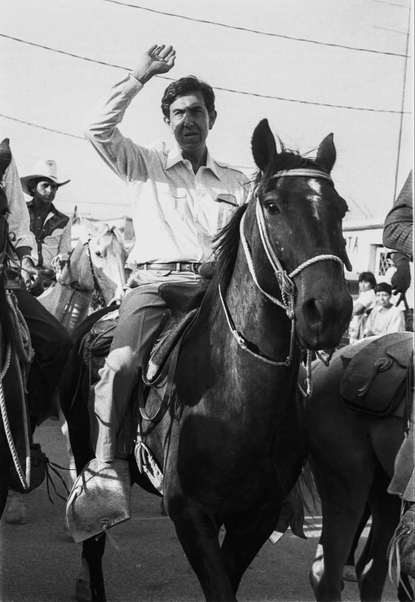 Cuauhtémoc Cárdenas rides a horse and waves during the "100 Hours March" in Mexico City in 1987.