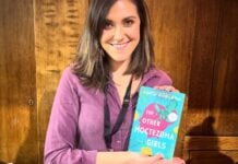 Sofía Robleda, holding a copy of her new novel, "The Other Moctezuma Girls."