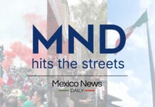 People wave Mexican flags behind text reading "MND hits the streets" and "Mexico News Daily"