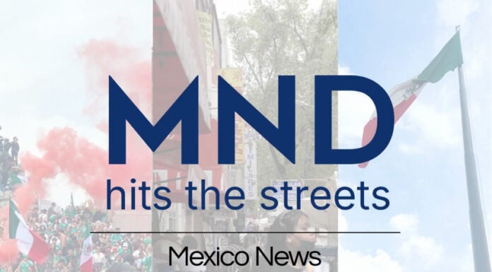 People wave Mexican flags behind text reading "MND hits the streets" and "Mexico News Daily"