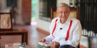 Former President Andrés Manuel López Obrador with his new book, "Pueblo"