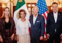 Ambassador Johnson and family alongside Mauricio Kuri