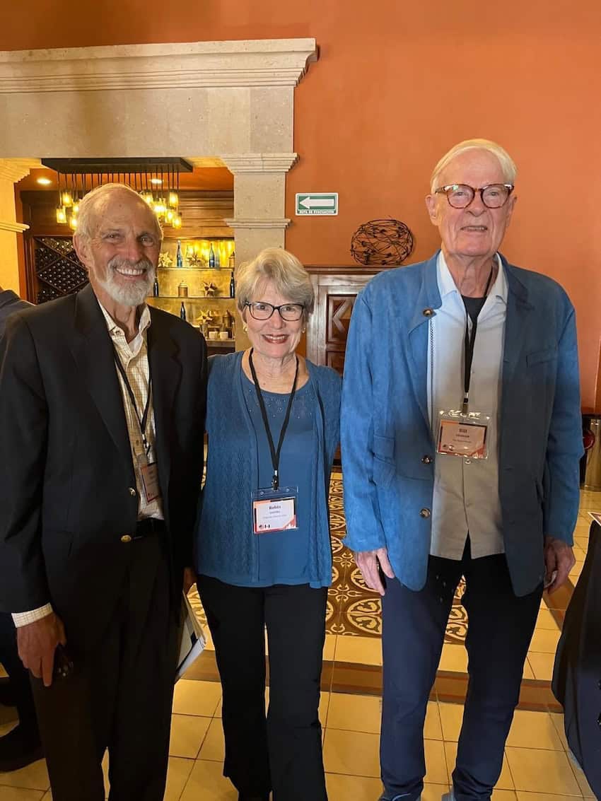 Three organizers of the San Miguel Forum are pictured at the event.
