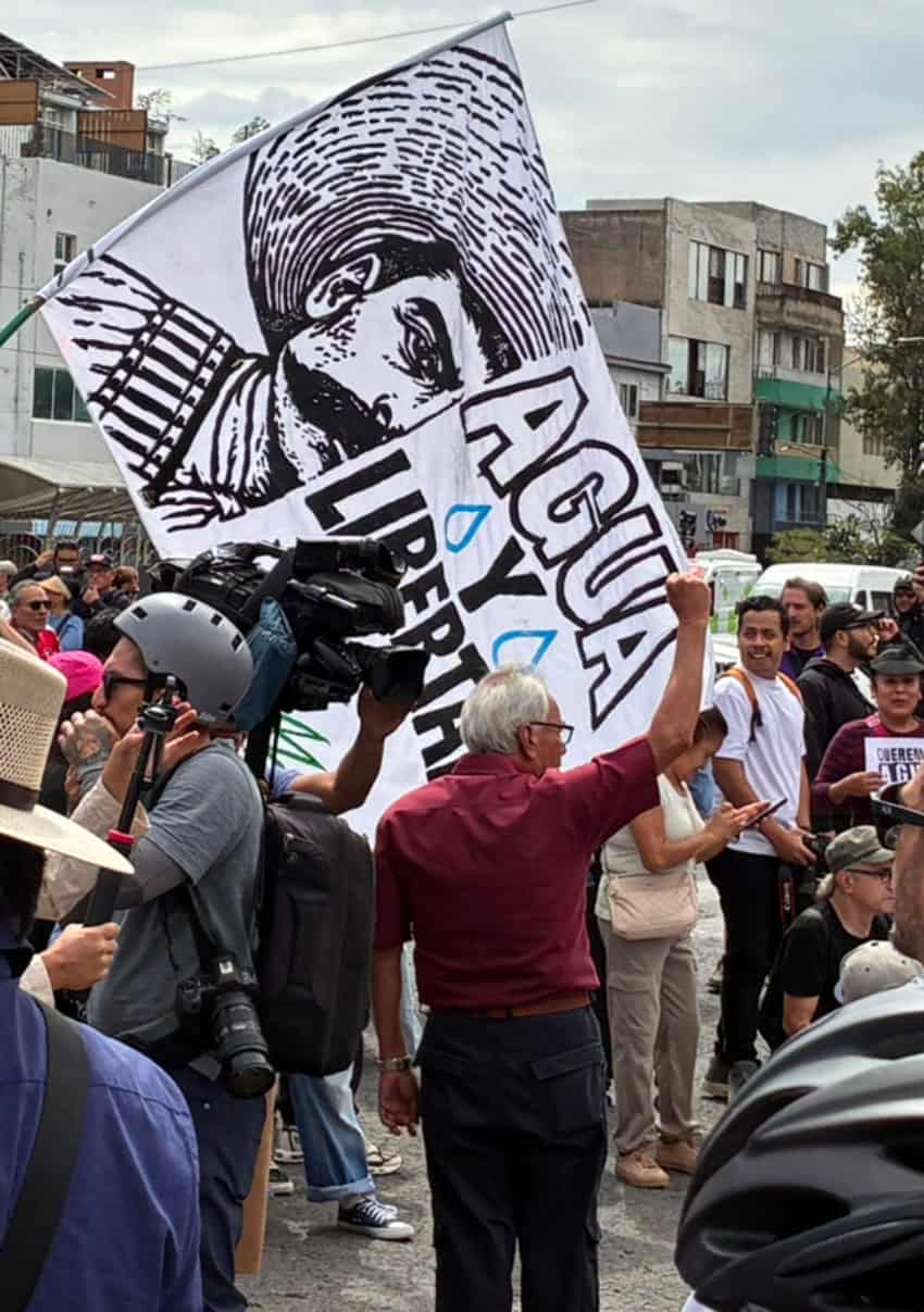 Protesters hold up "Agua y Libertad" banner during a protest against the ongoing Guadalajara water crisis