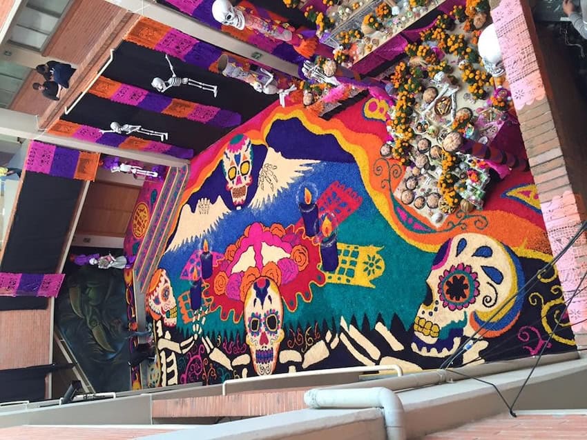 Colored sawdust carpet for the Day of the Dead in Mexico
