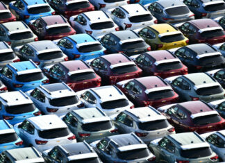 Rows of new parked cars ready for export