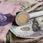 Mexican pesos and US dollar bills